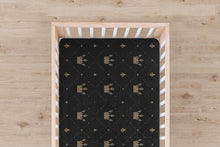 Load image into Gallery viewer, Designer Jersey Fitted Crib Sheet - Gold Crowns on Black