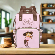 Load image into Gallery viewer, Designer Diaper Bags - Cute Cowgirl With Brown Cow Print On Soft Pink Waterproof Diaper Bag